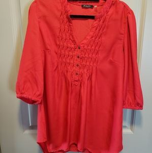 Bright red blouse